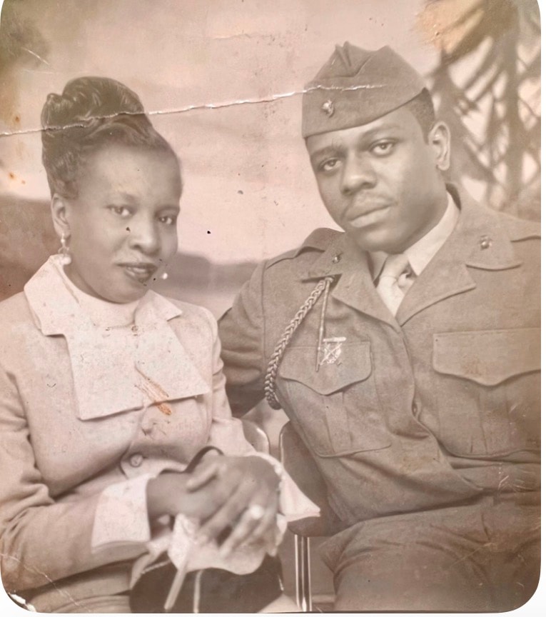 Torn and faded wartime couple portrait before restoration