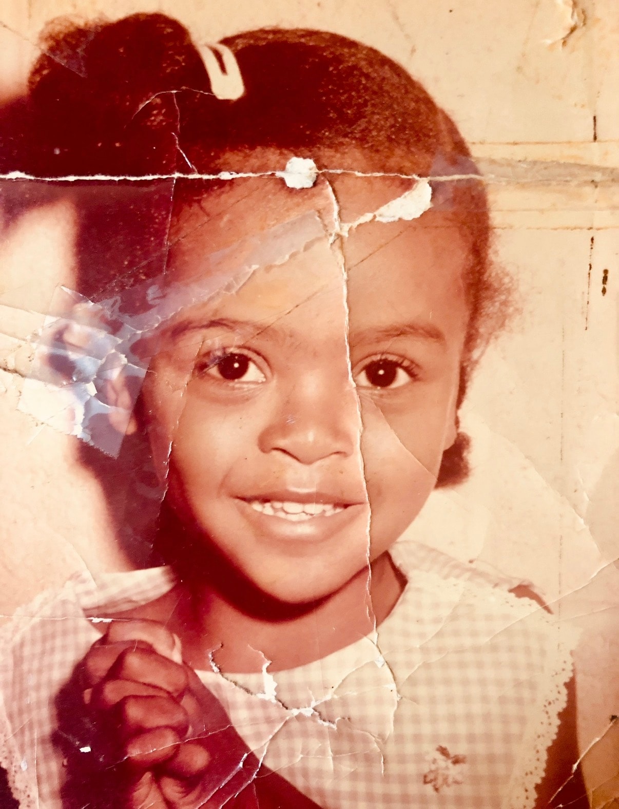 Damaged, faded family photograph before restoration